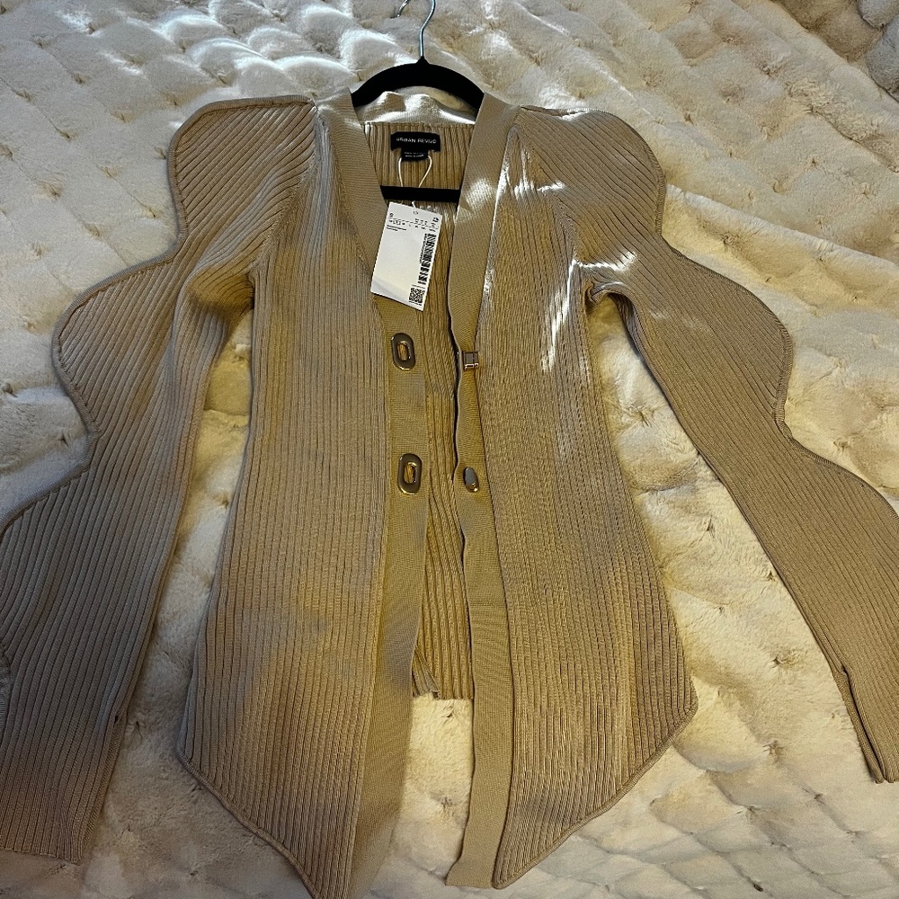 Woman’s beige sweater